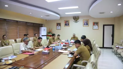 Pembangunan Kota Kotamobagu, Pj. Wali Kota, Tim Evaluator, Kemajuan Daerah, Transparansi Pemerintahan.